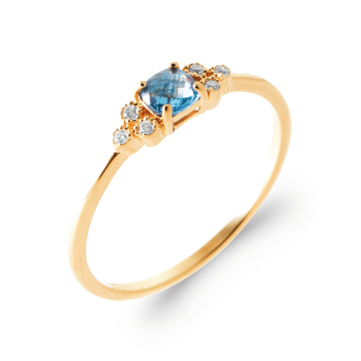 Bague Réunion plaquée or 3 microns pierre bleue centrale et oxydes de zirconium