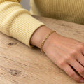Bracelet Moorea plaqué or 3 microns motif solaire, porté